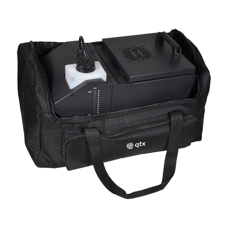 QTX General Equipment Bag in black nylon with front zip pocket and carry straps, shown holding a fog machine with fluid tank through the open top.