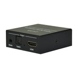 AV:Link 4K HDMI Digital Audio Extractor in a compact black metal casing, front panel showing 3.5mm stereo, Toslink optical and HDMI output ports.
