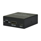 AV:Link 4K HDMI Digital Audio Extractor in a small black metal casing, front panel showing 2CH/5.1CH/PASS switch, HDMI input and micro-USB power port.