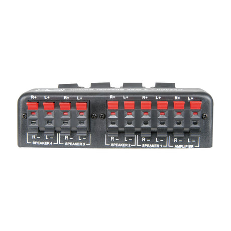 AV:Link AD-SPK42 4-way loudspeaker selector switch by AVSL, black casing with red and black spring clip terminals labelled for four speakers and amplifier.