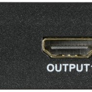 Close-up of the AV:Link 2x4 HDMI Matrix Switch Splitter showing a gold-plated HDMI output port on the black metal casing.