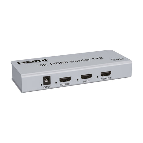 AV:Link 4KS12 8K HDMI 1x2 splitter in a satin silver metal casing with DC/5V power port, OUTPUT1, INPUT and OUTPUT2 HDMI sockets on a white background.