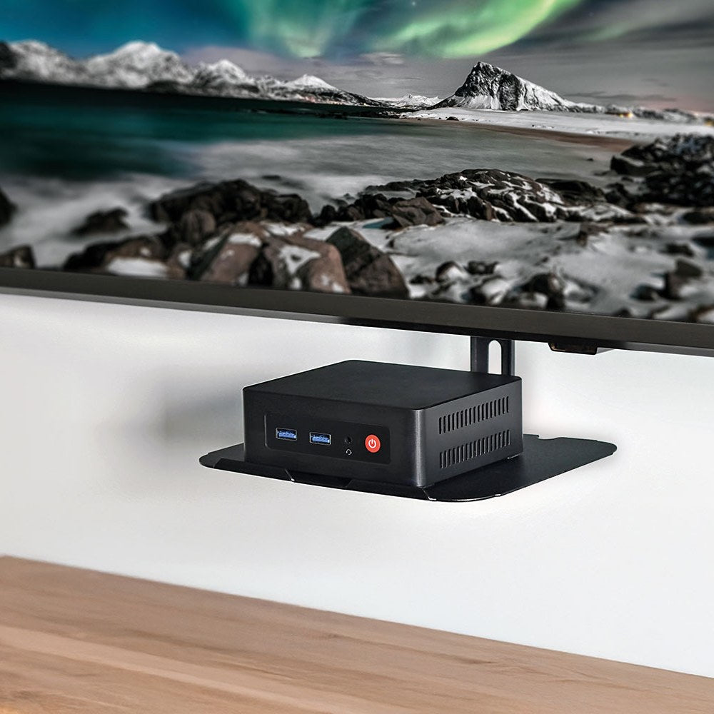 AV:Link ACS300 TV Accessory Shelf by AVSL mounted beneath a wall TV, holding a small black media box with USB ports and red power button.