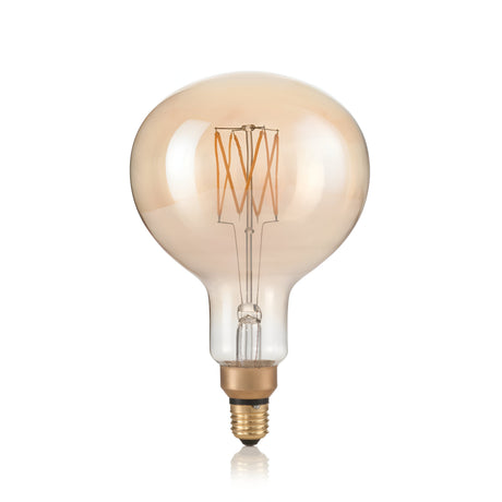The 4W Non-Dimmable LED Globe Filament Bulb - Amber, E27, 2200K exudes vintage charm with its amber-tinted glass and warm glow. Its spherical design and visible filaments complement the elegant brass screw base, all showcased beautifully against a white background.