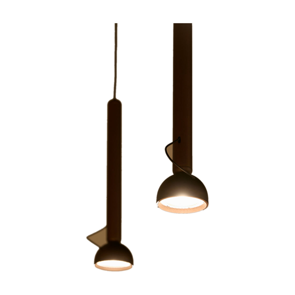 Berry S Aluminium LED Pendant Light shown in bronze, a slim tube pendant with a small angled domed head, pictured alongside a second suspended pendant against a plain white background.