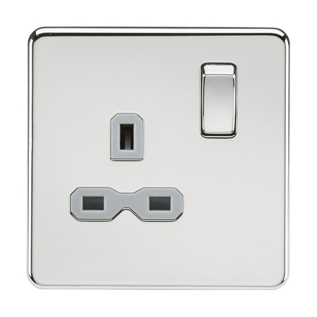 Introducing the 13A 1 Gang DP Switched Socket, featuring a polished chrome finish with a grey insert. This silver electrical wall socket showcases a sleek screwless flat plate design, complete with a single switch and three-pin outlet designed for UK plug types. Its polished chrome surface ensures a reflective and smooth finish.