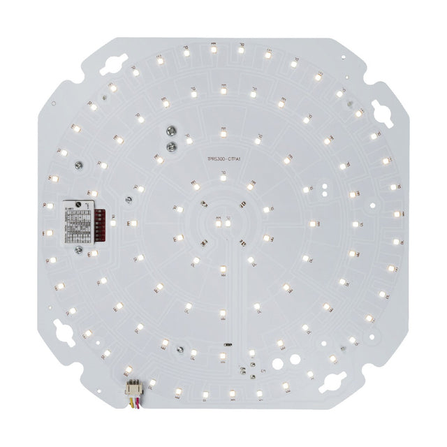 The TENAX 10-20W CCT LED Gear Tray With Sensor features a circular LED light board with many small bulbs arranged in concentric circles. Boasting a white background, its visible electronic components highlight advanced LED gear trays. The design includes adjustable wattage and color settings, providing versatile lighting solutions.