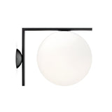 The Vetra 1 Light Opal Glass Wall/Semi-Flush Ceiling Light in Black features a minimalist L-shaped arm and large opal glass globe, adding modern style to any space when mounted on a wall with a white background.