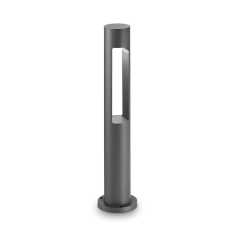 Introducing the Glintwave Outdoor Bollard Light - Grey, a sleek and modern lighting solution that embodies contemporary charm. This bollard light boasts a cylindrical design with a rectangular cutout for illumination, crafted from turned aluminum in an elegant grey finish, and is supported by a rounded base for easy ground installation.