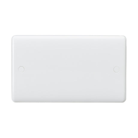 The 2 Gang Blanking Plate (Rounded Edge) is a plain, rectangular white plastic cover featuring smooth edges and two small circular indentations near the corners, enhanced with anti-microbial properties for extra hygiene.