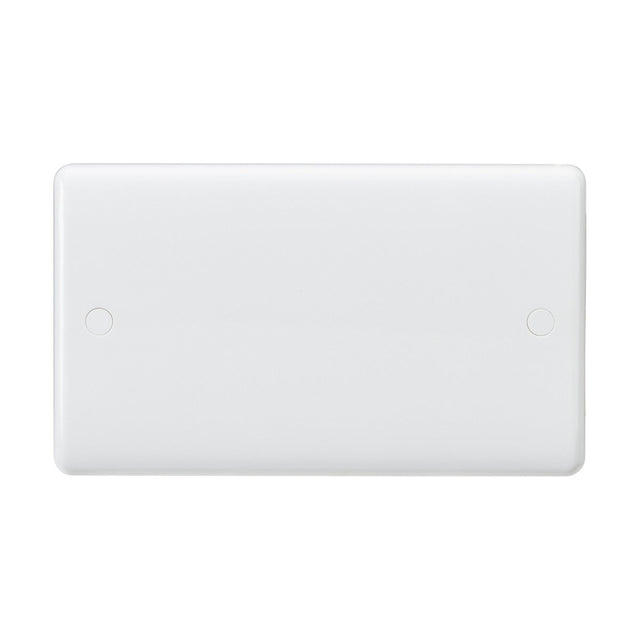 The 2 Gang Blanking Plate (Rounded Edge) is a plain, rectangular white plastic cover featuring smooth edges and two small circular indentations near the corners, enhanced with anti-microbial properties for extra hygiene.