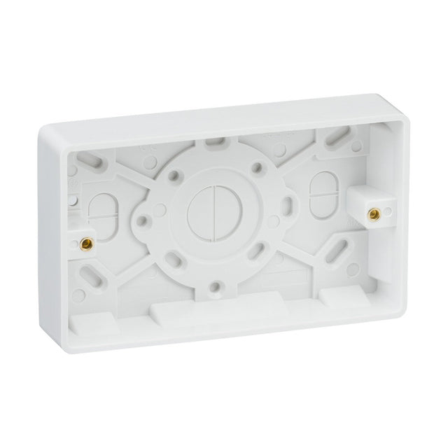 The Double 25mm Pattress Box (Rounded Edge) is a white rectangular mounting back box made of plastic, featuring multiple screw holes and cable entry points. It's perfect for installing electrical devices such as switches or sockets, and its minimalistic design pairs seamlessly with Knightsbridge Curved Edge wiring accessories, providing both functionality and sleek aesthetics.