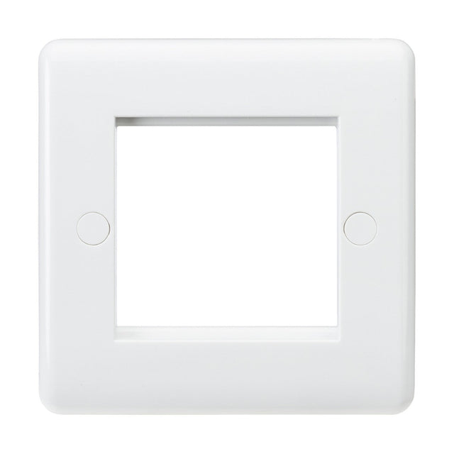The 2 Gang Modular Faceplate - White (Rounded Edge) is a square, plastic faceplate featuring anti-microbial properties, designed for electrical switches or euro-modules, with a central square cutout and two circular screw covers.
