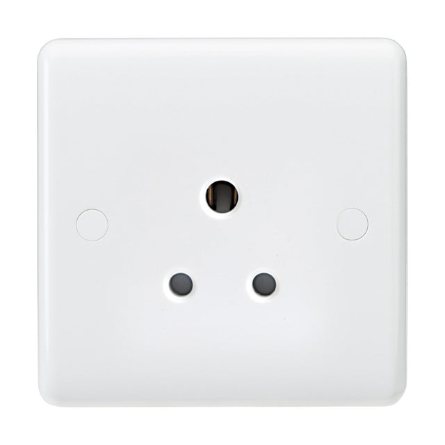 The 5A Unswitched Socket (Rounded Edge) is a white socket designed for a Type D plug, featuring three round pin holes in a triangular arrangement. It is made from thermoset resin with anti-microbial properties, set against a plain white background.