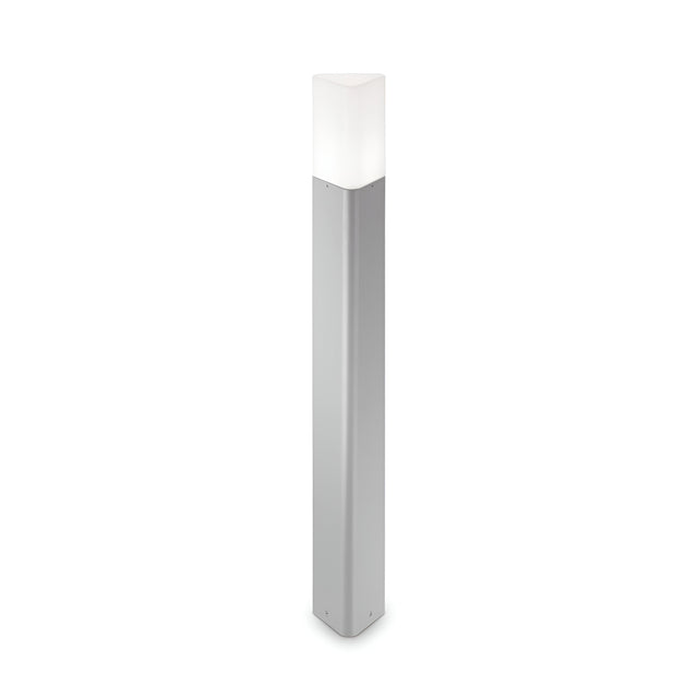 The Wave Outdoor Bollard Light - Grey boasts a sleek, rectangular design with a metallic gray finish and frosted white top, offering a durable lighting fixture and weather-resistant features.