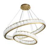 The Orion 64 Light 2 Tier Ring Alabaster Chandelier features brushed brass rings suspended by cables and lined with soft white alabaster panels, offering a modern and elegant lighting centerpiece.
