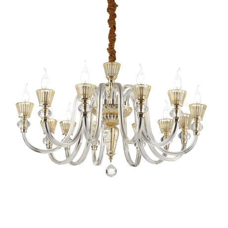 The Nexus 12 Light Chandelier - Gold/Chrome exudes luxurious elegance with its multiple curved arms, each showcasing a candle-shaped bulb. Made from a sophisticated mix of gold and chrome, it highlights clear and amber crystal accents and is gracefully suspended from the ceiling by a brown cord.