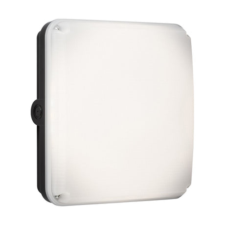 The TENAX One Square Bulkhead Casing - Black is a white LED light fixture in a square shape, accented with a black border, and crafted from durable polycarbonate. It features a smooth frosted surface. Its simple, modern design is sleek and weatherproof with an IP65 rating, making it suitable for both indoor and outdoor use.