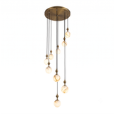 Niori Lorixa 9 Light Cascading Chandelier with staggered natural alabaster globes on brushed bronze caps and circular canopy, shown on a white background.