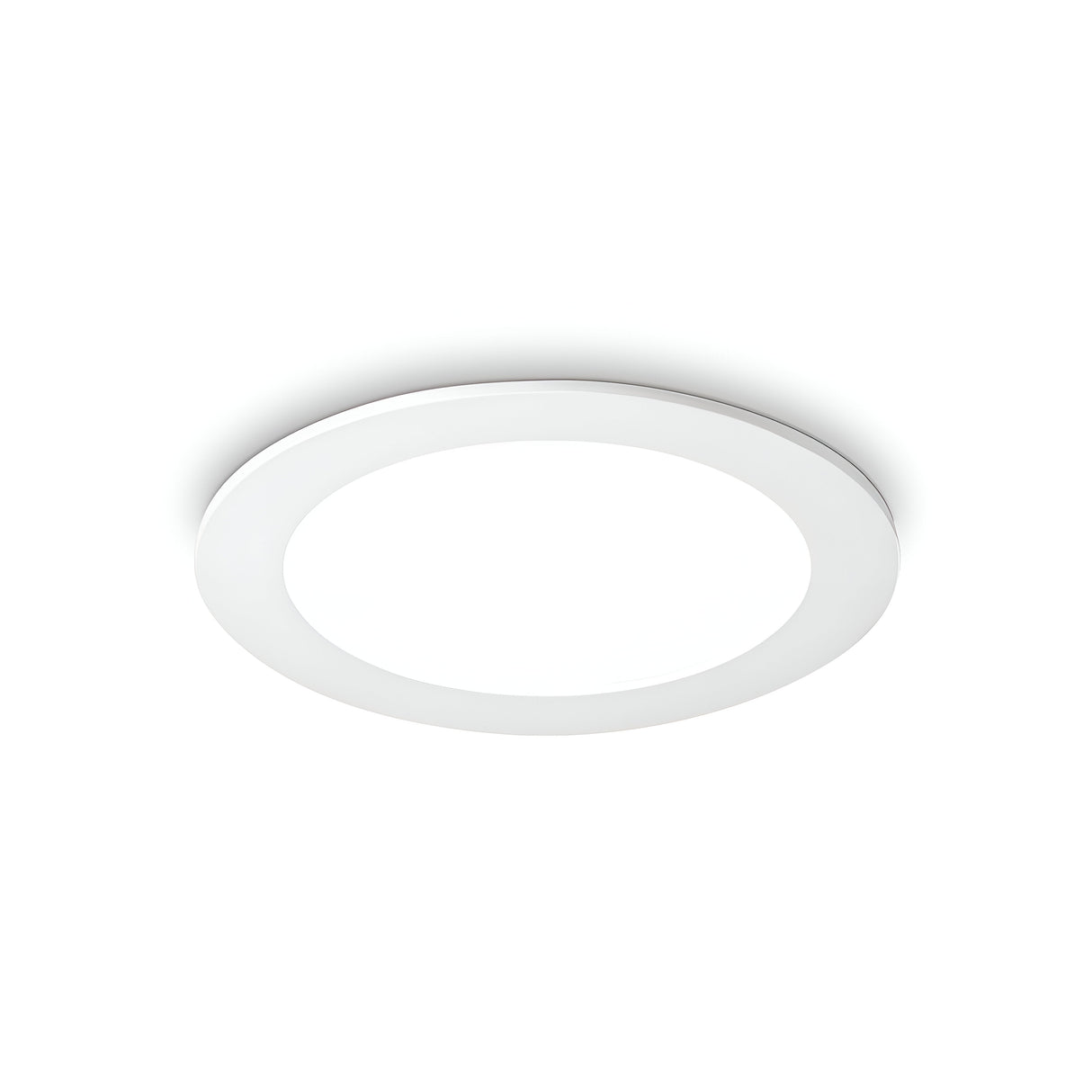 The Focus Round Recessed Downlight - 10W, 4000K in white, with its contemporary round design, stands out against a plain white background like a streamlined LED fixture. Its flat, minimalistic style casts a subtle shadow underneath, suggesting its flush-mounted installation for energy-efficient lighting.