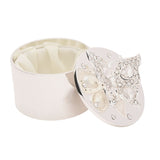 Round silverplated trinket box, 5.5cm, with lid open showing a cream satin lining, lid featuring a raised crystal-embellished butterfly on a textured silver backdrop, plain white background.