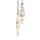 The Aurelia LED Alabaster Pendant Light – Soft White showcases stacked, translucent Spanish alabaster with brown veining, suspended by black and white cords against a plain white background.