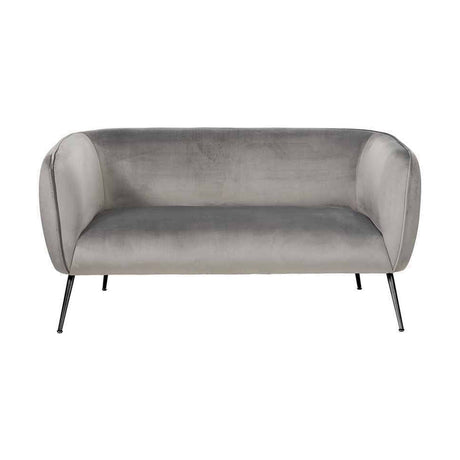 Lucca Dove Grey Velvet & Iron Sofa, 142cm, with curved barrel back, tapered black metal legs, and plush velvet upholstery, shown on a plain white background.