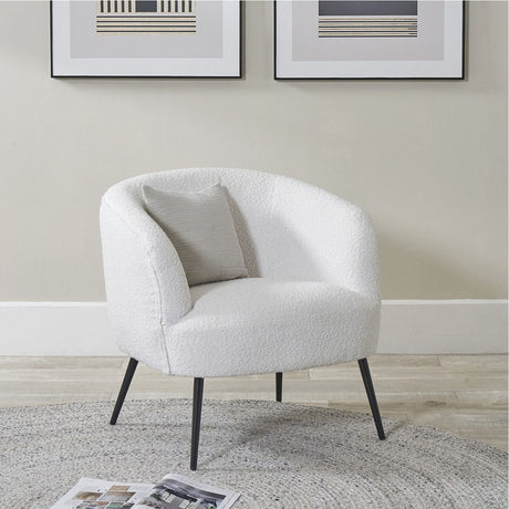 Siena Bouclé Fabric & Black Iron Tub Chair, 68cm, shown in a living room with white textured upholstery, curved back, cushion, and slim black tapered legs.