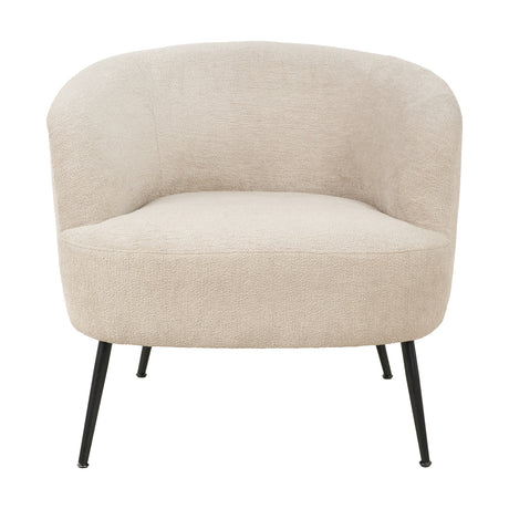 Aviana armchair with curved, barrel-shaped back in taupe teddy fabric upholstery, set on slim black metal legs, shown on a plain white background.
