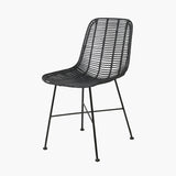 Black Rattan Core & Iron Dining Chair with woven rattan seat and back on a black metal four-leg frame with cross bar support, shown on a plain white background.