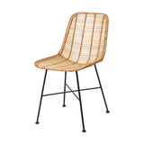 Rattan dining chair with woven natural core seat and back on black iron four-leg frame with cross brace, shown against a plain white background.