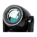 Close-up of the QTX GOBO Beam 100W LED moving head light by AVSL, showing the front lens ringed by ridged detailing on a black casing.