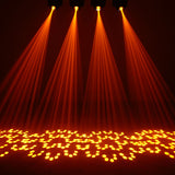 Four Citronic Orbis 100 LED beam moving heads projecting orange beams and scattered gobo dot patterns across a dark stage floor.