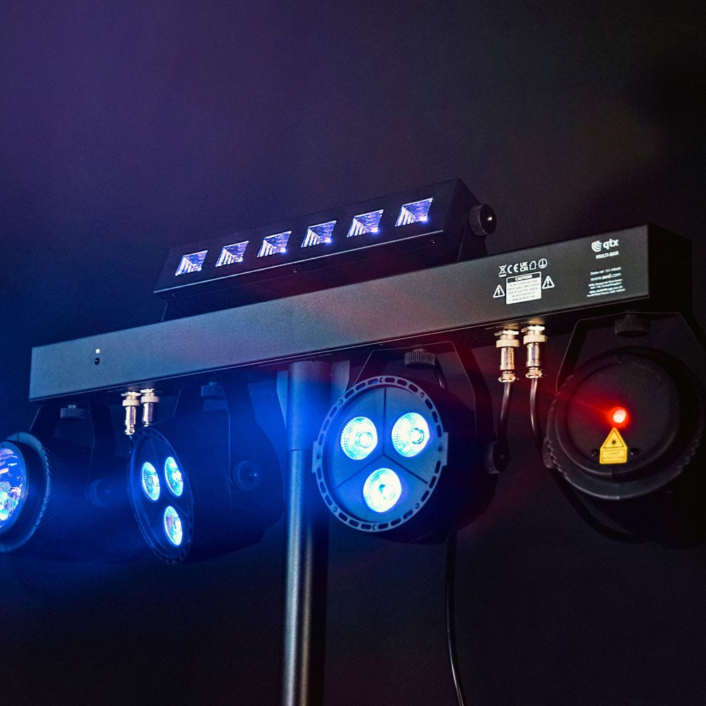 QTX Multi-Bar 5-in-1 RGBW Effects Lighting Bar by AVSL on tripod, showing UV strobe, two PAR cans, ball effect and red laser lit blue on dark background.