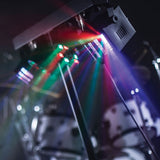 QTX LED Derby Par Can Light by AVSL projecting red, green, blue and white beams from its T-bar fixtures above a drum kit in a darkened venue.