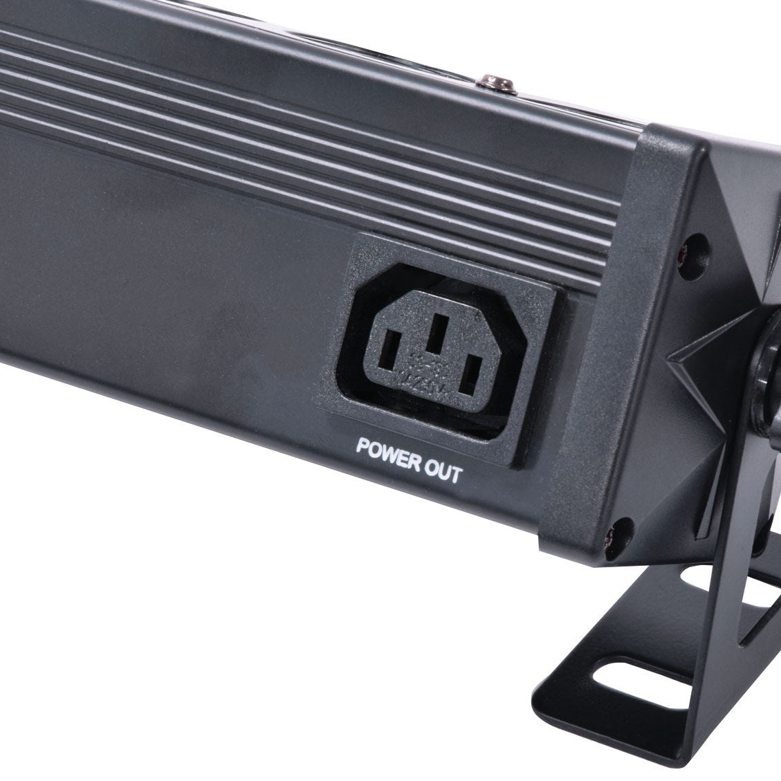 Close-up of the QTX LED wall wash bar's black metal end, showing the IEC power out socket and adjustable mounting bracket by AVSL.