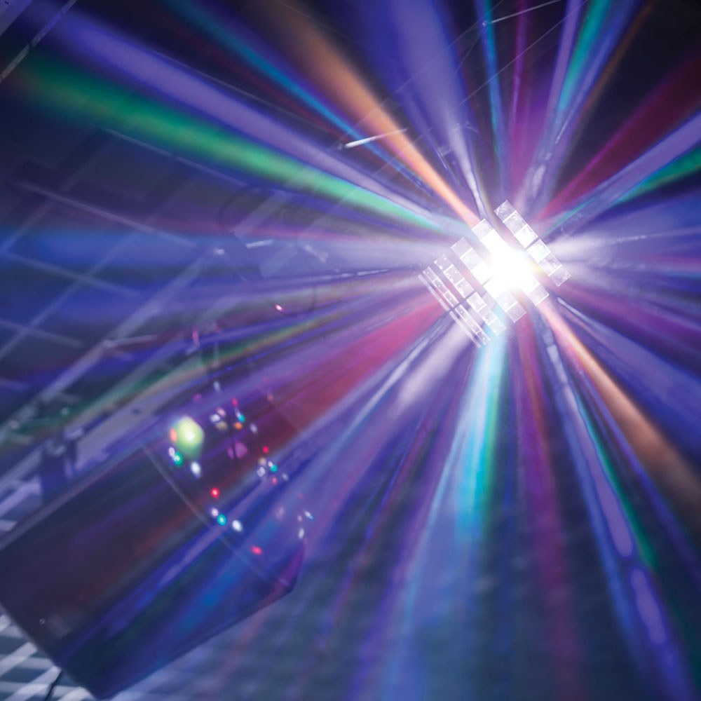 QTX Derby9 LED derby effect light by AVSL projecting multi-colour rotating beams of red, green, blue and white across a dark venue ceiling.