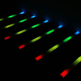 AVSL QTX Pixelator 144 RGB Pixel LED effects bars angled in a row, glowing in red, yellow, green and blue zones against a black background.