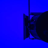 Side view of the Citronic MFZ160-RGBW 160W Mini Fresnel Zoom LED Light with barn doors and mounting bracket, lit against a deep blue background.