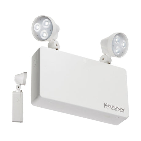 Introducing the Indoor Non-Maintained Emergency LED Twin Spot Bulkhead, a white unit featuring two adjustable LED lamps that emit a crisp 6000K daylight glow. It includes a smaller detachable lamp on the side and boasts durable polycarbonate construction with the Knightsbridge brand name prominently displayed on the front.