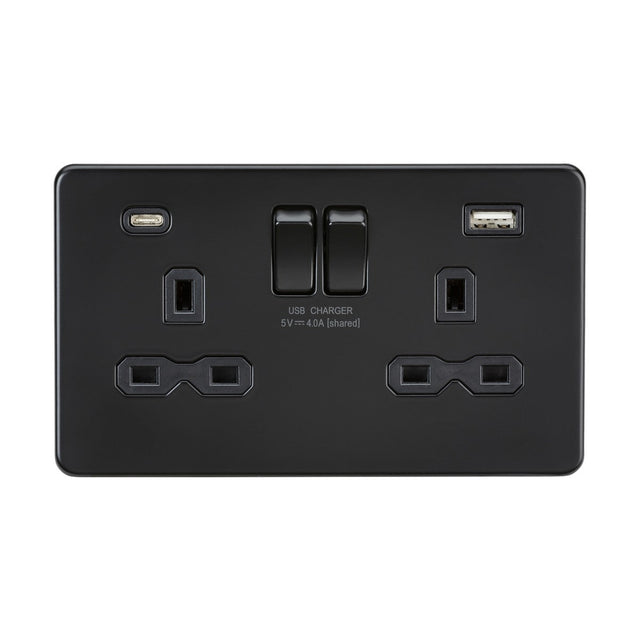 The 13A 2 Gang SP Switched Socket With Dual USB A+C in Matt Black features a modern screwless design and includes integrated USB charging ports. It offers one dual USB A+C port alongside a standard USB port and is equipped with two switches and two three-pin plug outlets for maximum convenience.