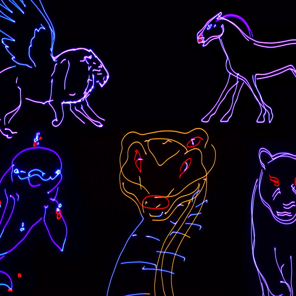 Citronic Animate Smart RGB laser projection showing neon outlines of a winged horse, snake, panther and other animals against a black backdrop.