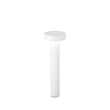 The Gloara Outdoor Bollard Light in white, measuring 60cm, features a sleek cylindrical design with a round top that exudes a minimalist and modern aesthetic. It stands alone against a plain white background, highlighting its simple and clean lines reminiscent of contemporary outdoor lighting solutions.