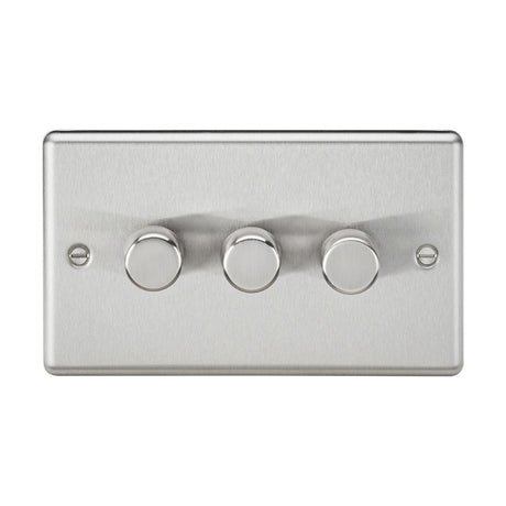 The 3 Gang 2-Way 10-200W (5-150W LED) Intelligent Dimmer in Brushed Chrome features a sleek design with three round, silver knobs arranged horizontally for rotary dimming action. It supports trailing-edge mode and is secured with two visible screws on each side, complemented by its rounded edge finish.