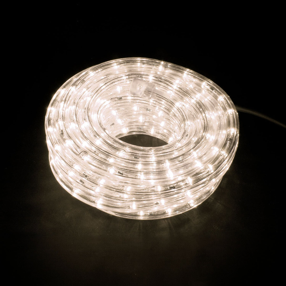 LYYT 50m LED rope light coiled on a reel, glowing warm white 2800K through a clear flexible tube, shown on a black background.