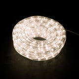 LYYT 50m LED rope light coiled on a reel, glowing warm white 2800K through a clear flexible tube, shown on a black background.
