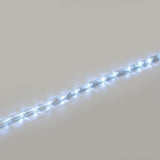 LYYT 50m LED rope light illuminated in cool white 5000K, showing the clear PVC tube with visible LED points running diagonally across a plain background.