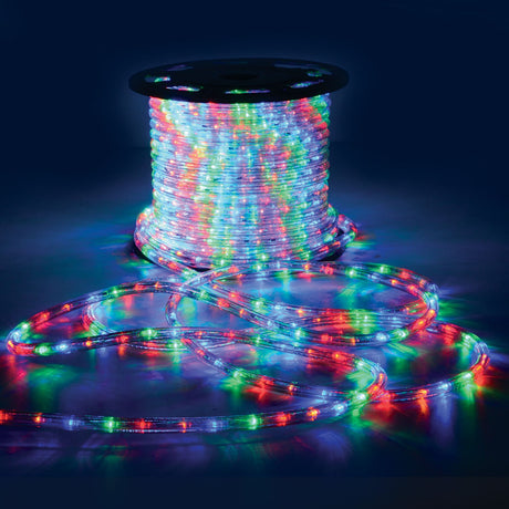 LYYT 50m multicoloured LED rope light on a black reel with lit clear PVC tubing coiled across the floor, glowing red, green, blue and white.