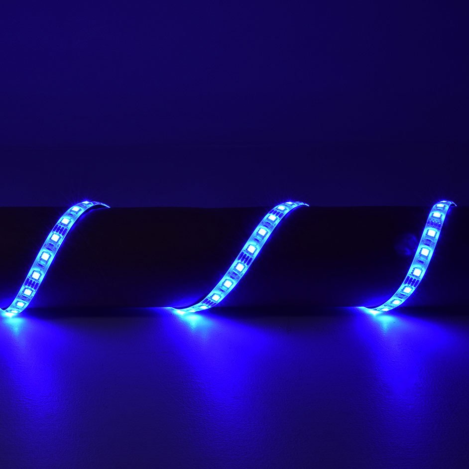 LYYT 5m RGB LED strip kit by AVSL installed in three waves against a dark surface, illuminated in bright blue along the flexible IP68 silicone tape.