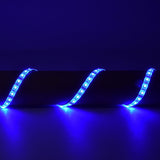 LYYT 5m RGB LED strip kit by AVSL installed in three waves against a dark surface, illuminated in bright blue along the flexible IP68 silicone tape.